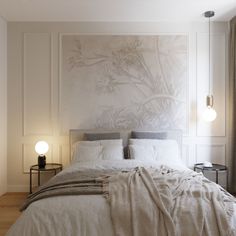 a bed with white linens and pillows in a bedroom next to a painting on the wall