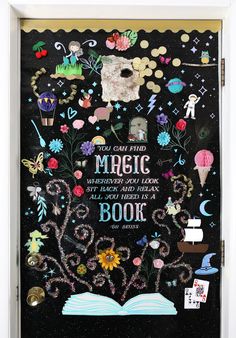 a black door decorated with colorful magnets and writing on it's front cover