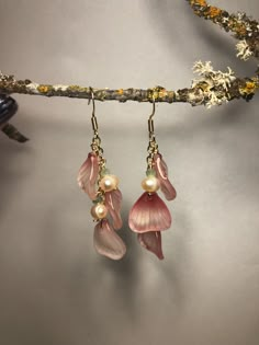 These delicate petals and dairy pearls are very eye-catching! They heighten the whimsy of any outfit. The hooks are 14k gold-plated. Made thoughtfully in Eugene, OR. Uv Resin Crafts, Character Accessories, Pink Flower Earrings, Drop Jewelry, Pink Petals, Flower Fairy, Uv Resin, Pretty Jewellery, Wedding Flower