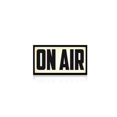 an on air sticker is shown in black and white with the word on it