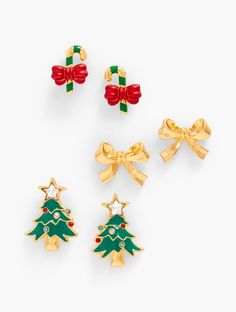 Sparkle from any angle in our perfect-for-everyday stud earrings. In a holiday-inspired design. Set of three features an adorable holiday tree, a pretty gold bow and a sweet candy cane. A versatile addition to your jewelry box. Gift holiday cheer to yourself and a loved one! Features Post Imported Fit: 7/8" Candy Cane, 1/2" Bow, 5/8" Tree Material: 60% Zinc, 20% Glass, 10% Enamel, 5% Painting, 4% Surgical Steel, 1% Cubic Zirconia | Holiday Whimsy Charm Stud Earring Set Talbots Christmas Earings, Tree Material, Jewelry Box Gift, Everyday Earrings Studs, Classic Style Women, Sweet Candy, Box Gift, Accessories Jewelry Earrings, Christmas Jewelry