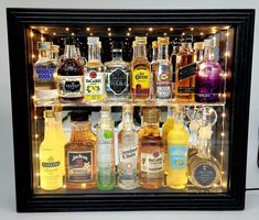 a display case filled with lots of liquor bottles