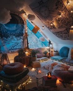 a room filled with lots of pillows and lights