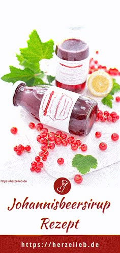 a bottle of ketchup sitting on top of a table next to some leaves