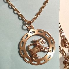 Nice Piece! Round Open-Work Pendant With A Freestanding Prancing Lion Figure. Stamped 14k. Not Sure Of Age, But It's Been Taken Very Good Care Of. Free Chain Included. Luxury Gold-tone Round Medallion Necklace, Luxury Gold-plated Medallion Necklace With Adjustable Chain, Luxury Gold-tone Medallion Pendant Necklace, Gold Lion Necklace, Gold Lion Pendant Jewelry, Gold Lion, Lion Pendant, Womens Jewelry Necklace, Lion