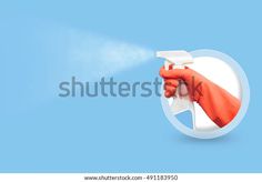 a hand with an orange glove is spraying disinfectant on a blue background