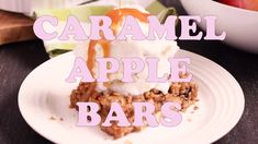 a white plate topped with an ice cream sundae covered in caramel apple bars