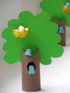 paper mache trees with birds and eggs in them