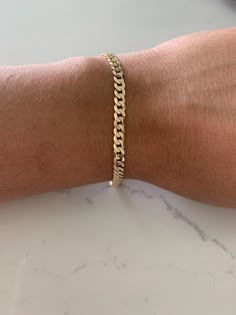 This 14K Yellow Gold Cuban Link Bracelet boasts an impressive 4.8MM width and 8" length. Crafted from 14K gold and featuring a lobster clasp, this luxurious piece is ideal for both men and women. Show off your style with this solid and real gold bracelet. ------------------------------------------- ------------------------------------------------- Great bracelet for everyday wear. It is 14K solid Gold. The 14K Gold Bracelet makes a great gift for any loved one Birthday present. Get yours today. Bracelet For Men Gold For Him, Gold Wrist Jewelry, Gold Men Jewelry, Men’s Gold Bracelet, Man Bracelet Gold, Men Gold Bracelet, Gold Bracelets For Men, Gold Cuban Link Bracelet, Silver Evil Eye Bracelet