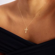 "1- P R O D U C T ∙ D E S C R I P T I O N This 14k gold cross necklace is a beautiful and timeless piece of jewelry, perfect for everyday wear or special occasions. The 14k gold material offers a stunning shine and durability, ensuring that this necklace will last for years to come. The cross design adds a touch of elegance and spirituality, making it a thoughtful gift for anyone who values faith. 2- P R O D U C T ∙ D E T A I L S Diamond quality: * Diamond carat: 0.06 ct. * Clarity: SI2 * Color: 14k Gold Diamond Cut Cross Necklace, Fine Jewelry Cross Necklace For Anniversary, 14k Gold Cross Necklace For Anniversary, 14k Gold Cross Pendant Necklace For Anniversary, 14k White Gold Crucifix Necklace, Yellow Gold Diamond Cut Cross Pendant Necklace, White Gold Cross Necklace With Clavicle Chain, Elegant Yellow Gold Crucifix Necklace, Elegant Diamond Cut Cross Necklace