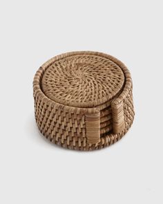 three wicker baskets stacked on top of each other