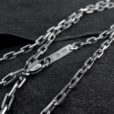 "This is an Oxidized Silver Anchor chain of 3,1mm thickness. The little tag with the closing can be personalized with some initials. ◆ HOW TO KNOW YOUR SIZE The simplest way is to measure an existing necklace on the length you would like to have. If you don't have an existing necklace to measure from, you can use some string, ribbon or a soft measuring tape an measure it with the different lengths we offer. Stand in front of a mirror. You might need a safety pin or another person to hold the end Black Sterling Silver Link Chain Necklace, Rustic Wedding Bands, Unicorn Pendant, Choker Jewelry, Anchor Chain, Bohemian Beach, Wide Band Rings, Jewelry Choker, Necklace Black