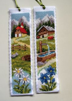 two cross stitch bookmarks with farm scenes on them