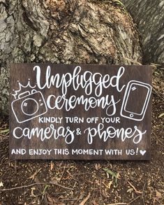 a wooden sign that says unplugged ceremonys kind of turn off your cameras and enjoy this moment with us