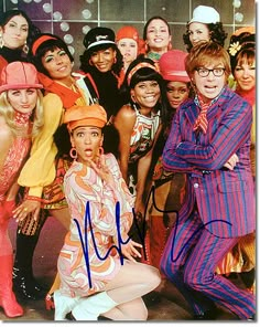 an autographed photo of the cast of saved me