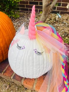 Paint
Pre-bought horn from party store
Tulle braid 
Stickers for embellishment! Pumpkin Decorating For Kids, Unicorn Pumpkin Painting, Unicorn Pumpkin Painting Ideas, Unicorn Pumpkin Carving, Unicorn Pumpkin Decorating, Pumpkin Painting Unicorn, Unicorn Painted Pumpkin, Thelma The Unicorn Pumpkin, Pumpkin Unicorn