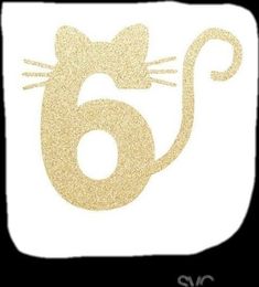 a gold glitter number six with a cat on it