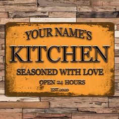 a sign that says your name's kitchen seasoned with love open 24 hours