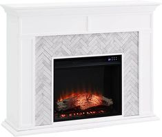 a white fireplace with an electric fire in it