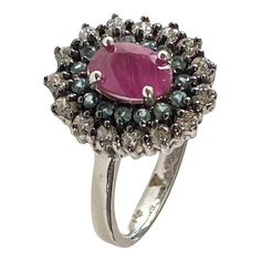 This elegant sterling silver ring size 5 is embellished with an oval Ruby and semi-precious round stones Aquamarine, along with sparkling glass diamonds. It is marked with the quality stamp "925" and can be easily adjusted . Oval Halo Ring With Multi-stone Diamond, Oval Cluster Ring With Gemstone Accents, Fine Jewelry Rings With Stones For Formal Occasions, Formal Oval Cluster Ring With Gemstone Accents, Oval Diamond Ring In White Gold With Gemstone Accents, Formal Fine Jewelry Rings With Stones, Elegant Round Diamond Ring With Stones, Elegant Round Diamond Ring, Diamond Cluster Ring With Gemstone Accents