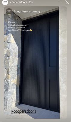 an image of a black door on the side of a building with text overlaying it