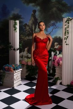 Indulge in elegance with our Red Corset Maxi Dress, featuring exquisite handmade draping adorned with captivating red stones at the bust. The boning structure enhances your silhouette while providing support and comfort. Crafted from luxurious sateen fabric and lined with silk, this dress offers a lavish feel against your skin. Perfect for special occasions, it exudes sophistication and allure, ensuring you stand out with grace and glamour wherever you go.

• Red Maxi Dress with Corset Boning structure

• Handmade draping with red stones at bust

• Sateen fabric with silk lining

• Model is 5’9 and wears a size small Satin Mermaid Dress, Red Mermaid Prom Dress, Red Mermaid, Red Corset, Spaghetti Strap Prom Dress, Prom Looks, Evening Dress Fashion, Red Dress Maxi, Mermaid Evening Dresses