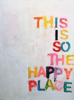 this is so the happy place written in multicolored letters on a white wall