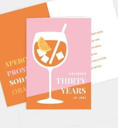 two greeting cards with an orange and pink background, one has a drink in it