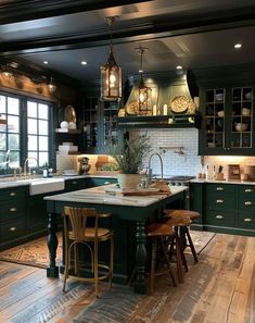 a large kitchen with green cabinets and wooden flooring, an island table surrounded by stools