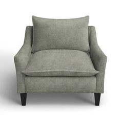 a gray chair on a white background with a black leg and arm rests up against the wall