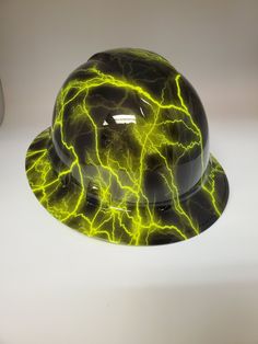 Neon Lightning and Black on a Pyramex® Ridgeline® Protective Hard Hat. The hard hat comes equipped with original Pyramex® hard hat suspension with ratchet wheel. Proudly customized in the USA. Non-Vented Hard Hats meet ANSI Z89.1-14, CSA Z94.1-15, Type I Class C, E & G. Construction Helmet, Fireman Hat, Festival Outfits Men, Construction Safety, Safety Helmet, Hard Hats, Hard Hat, Caps Hats, Accessories Hats