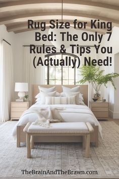 a bed with white linens and pillows in a room that says rug size for king bed the only 7 rules & tips you actually need