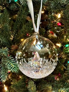 an ornament hanging from the christmas tree