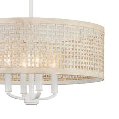 a white chandelier hanging from a ceiling fixture with woven fabric on the drum