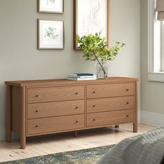 a bedroom scene with focus on the dresser