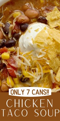 a bowl of chicken taco soup with tortilla chips and sour cream on top