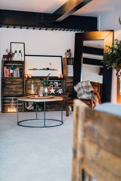 a living room filled with furniture and decor