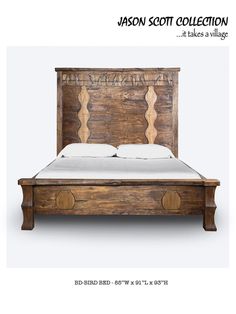 the bed frame is made from wood and has white sheets on it, along with an intricate carved headboard