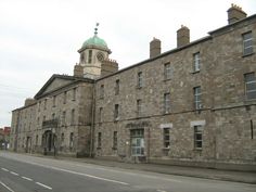 an old brick building with a clock tower