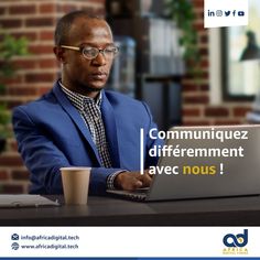 a man sitting at a table with a laptop computer in front of him that says communiquez different avec nous