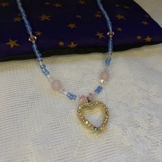 This necklace says Trans Rights ! The light pink of the rose quartz, the translucent blue beads, and white spacers all come together to make a very subtle trans pride necklace. Rose Quartz is said to promote self love. The heart shaped pendant has a crystal side and a pearl side, so there's two looks in one. The cute pastel colors will make this piece stand out on any occasion ! Cute Pastel Colors, Pride Necklace, Trans Rights, Trans Pride, Cute Rose, Rose Quartz Necklace, Necklace Rose, Heart Shape Pendant, Quartz Rose