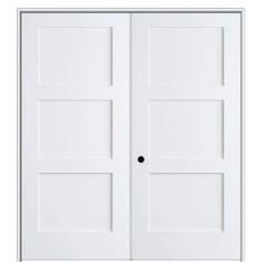 two white doors with black knobs on each side and one door open to the other