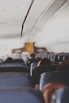 an airplane seat with arabic writing on it