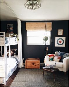 a living room with bunk beds and a couch