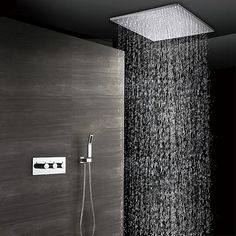 a shower head with rain coming out of it