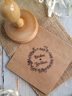 a rubber stamp with the words martha innstine on it next to some flowers