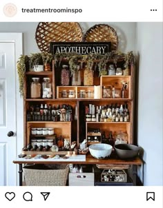 a wooden shelf filled with lots of bottles and jars