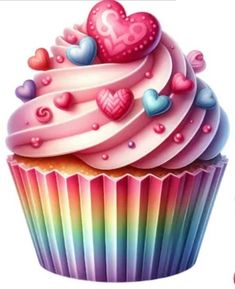 a cupcake with pink frosting and hearts on top, surrounded by rainbow colored icing