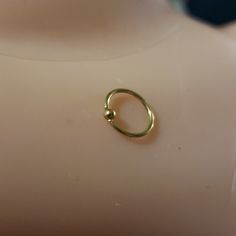 This Is A Brand New Stainless Steel 20g (20 Gauge) Nose Ring Hoop Shaped Piercing Jewelry... It's Stainless Steel But Gold In Color Hoop With Gold Ball That Does Pull Apart Easy For Putting In The Nose... Gold Hoop Nose Ring, Minimalist Glam, Hoop Nose Ring, Nose Ring Hoop, Black Drop Earrings, Peridot Earrings, Vintage Style Earrings, Bride Earrings, Nickel Free Earrings