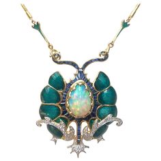 Opal 7.57 carats, Blue Sapphire 14.43 carats and Diamond 1.0 carat Necklace set in 18 Karat Gold Settings Width: 5.0 cm Length: 51.0cm Total Weight: 37.1 grams "We first opened doors in 1980 when it was then situated in the vicinity of the Victory Monument; a small and modest storefront with a couple of counters. From its humble beginnings to where it stands today, our company has proven its abilities as a jeweler. Since the beginning, we have been supplying fine quality pieces to dealers, whole Sapphire Diamond Necklace, Antique Necklaces Design, Antique Necklaces, Fictional Women, Rene Lalique, Nouveau Jewelry, Diamond Necklace Set, Blue Sapphire Diamond, Unusual Jewelry